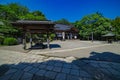 A Japanese traditional temple JINDAIJI at the old fashioned street in Tokyo wide shot Royalty Free Stock Photo