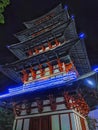 Japanese type of building with purple lights