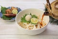 Japanese udon dishes sprinkling soup stock to noodles directly