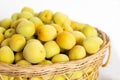 Fresh Japanese UME plum in wicker basket