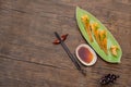 Japanese unagi sushi on green plate wood table