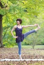 Japanese Woman Doing YOGA Extended Hand-To-Big-Toe Pose Royalty Free Stock Photo