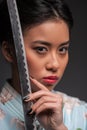 Japanese woman with katana Royalty Free Stock Photo