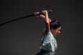 Japanese woman with katana Royalty Free Stock Photo