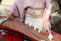 Japanese woman playing the traditional instrument Royalty Free Stock Photo
