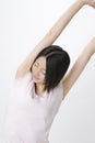 Japanese woman stretching Royalty Free Stock Photo