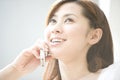 Japanese woman talking with cell phone Royalty Free Stock Photo