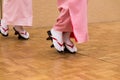 Japanese women dancing in traditioanl dress and geta shoes Royalty Free Stock Photo