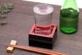 Japanese wooden box masu with sake