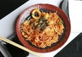 Japanese yakisoba noodles in white plate on wood table