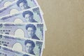 Japanese yen on brown paper background Royalty Free Stock Photo