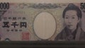 5000 Japanese yen money composition. Financial background. Many banknotes and wads of money. 3d render.