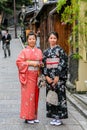 Japanese young women dressed up as geishas in the streets of Nara