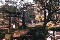 Japanese Zen garden with a gate and pagoda in Kenrokuen garden Kanazawa Royalty Free Stock Photo