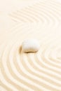 Japanese Zen stone garden. relaxation, meditation, simplicity and balance concept. pebbles and wavy sand tranquil calm scene Royalty Free Stock Photo