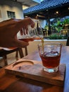 Japanesse coffee pouring to the glass oemago