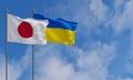 Japon and Ukraine flags. Blue sky and flag Japon and Ukraine. 3D work and 3D image Royalty Free Stock Photo