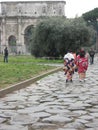 JAPONESE TOURISTS WALK IN DIRECTION OF THE ARCH OF COSTANTINO