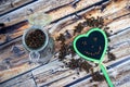 Jar of coffe beans, smile and heart of blackboard.