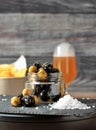 Jar of black and green olives, lined with aromatic herbs appetizers, snacks and pickles