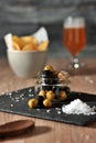 Jar of black and green olives, lined with aromatic herbs appetizers, snacks and pickles