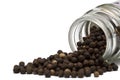 A jar of black peppercorns. Royalty Free Stock Photo