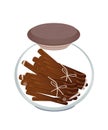 Jar of Cinnamon Sticks on White Background