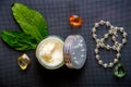 Jar with cream and accessories, top view