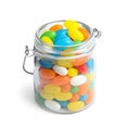 Jar of delicious color jelly beans isolated Royalty Free Stock Photo