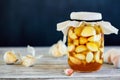 Jar of Fermented Garlic Cloves in Honey Royalty Free Stock Photo