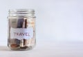 A jar filled with British coins and banknotes Royalty Free Stock Photo