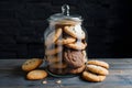 A jar filled with homemade cookies, some displayed beautifully