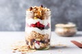 a jar filled with layered homemade muesli