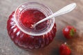 Jar of fresh homemade strawberry preserve