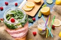 Jar of fresh raspberry lemonade on table Royalty Free Stock Photo