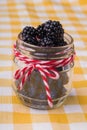 Jar full of blackberries.