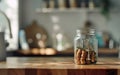 Jar full of coins in minimalistic room. Copy space, blurred background, defocused. Value hacking concept. ROI optimization, Royalty Free Stock Photo