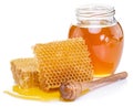 Jar full of fresh honey and honeycombs.