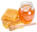 Jar full of fresh honey and honeycombs. Royalty Free Stock Photo