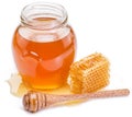 Jar full of fresh honey and honeycombs.