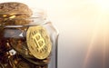 Jar with golden Bitcoin. Ways of storing cryptocurrencies creative concept. 3D rendering