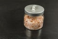 A jar of Himalayan salt. Royalty Free Stock Photo