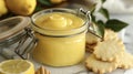 A jar of homemade lemon curd served with a side of delicate shortbread cookies for dipping Royalty Free Stock Photo