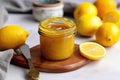 jar of homemade lemon curd with a swirl of yellow Royalty Free Stock Photo