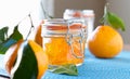 Jar of homemade orange jam with wide aspect ratio