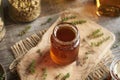 A jar of homemade thyme syrup Royalty Free Stock Photo