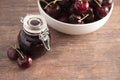Jar of Homemdae Cherry Jam on a Rustic Wooden Table Royalty Free Stock Photo