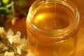 Jar of honey with flowers