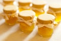 Jar of honey on white table jam