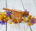 Jar of honey with wildflowers Royalty Free Stock Photo